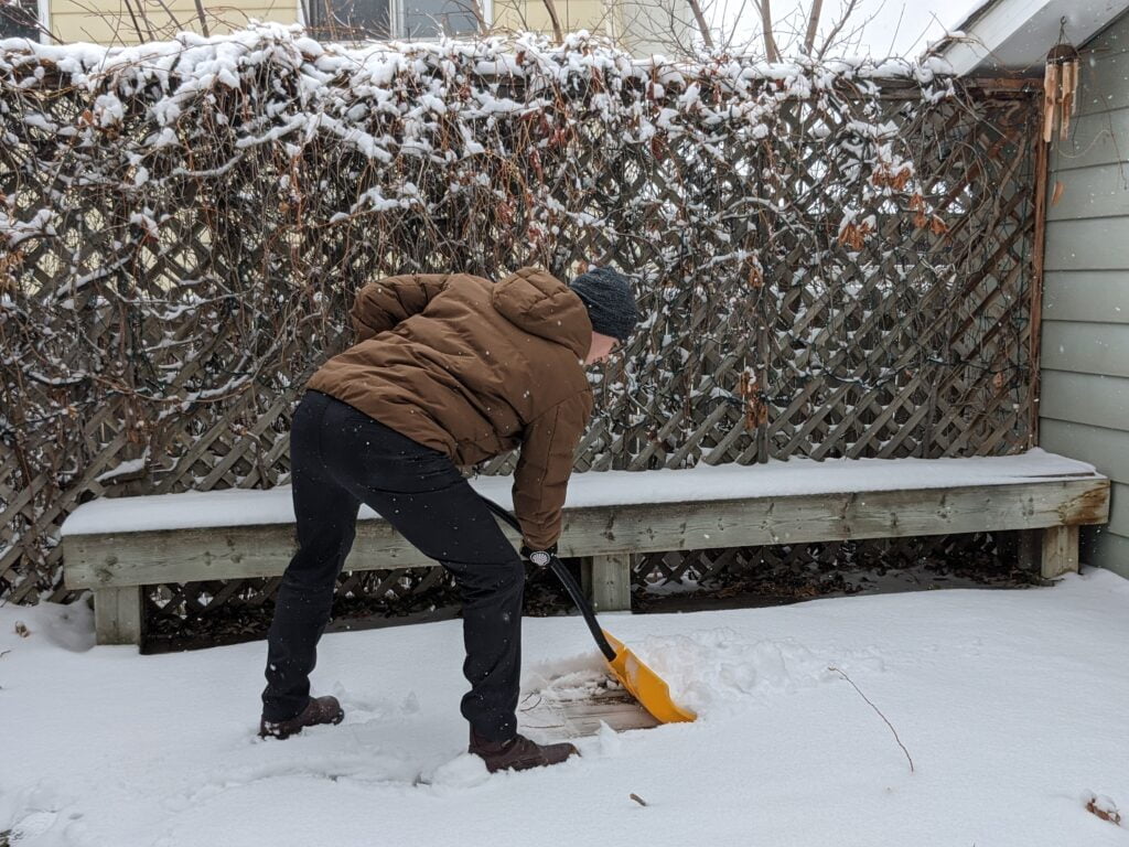 man shovelling snow